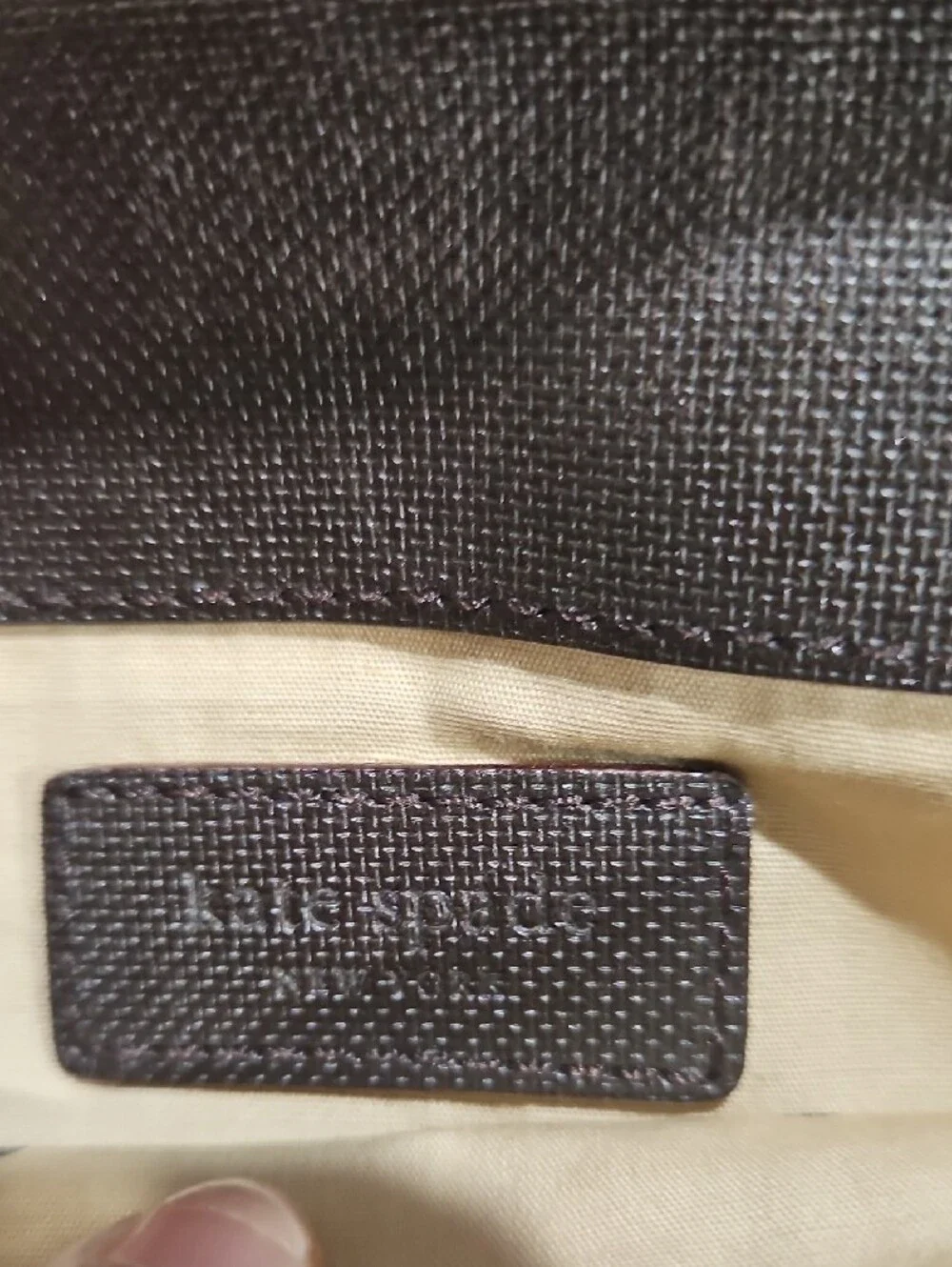 kate spade leather wristlet In Brown with gold hardware